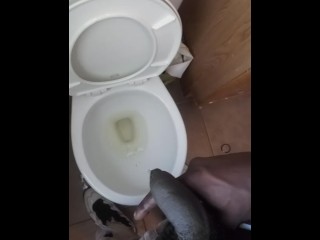 Pissing on hand and floor at work