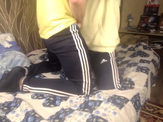 Two Guys in Sportswear Hugging